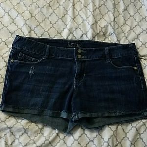 Distressed dark wash jean shorts